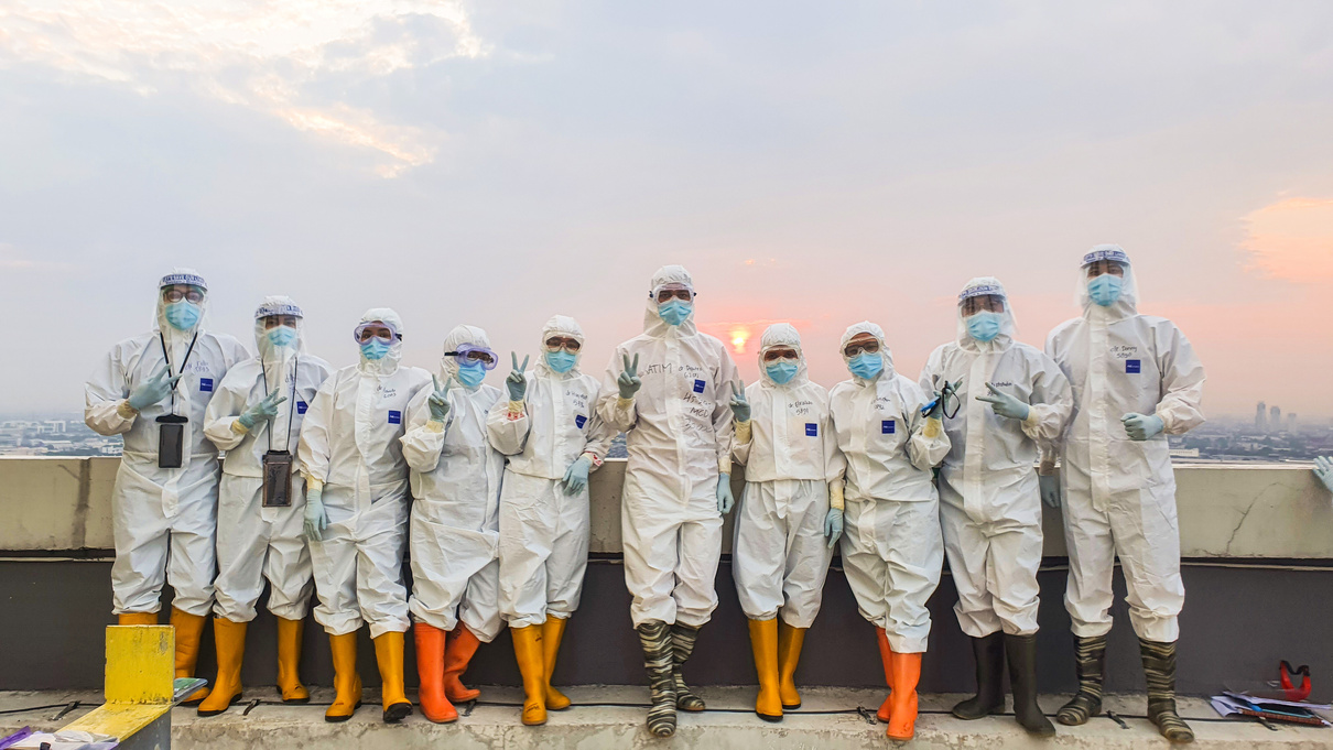A Group of People Wearing Personal Protective Equipment
